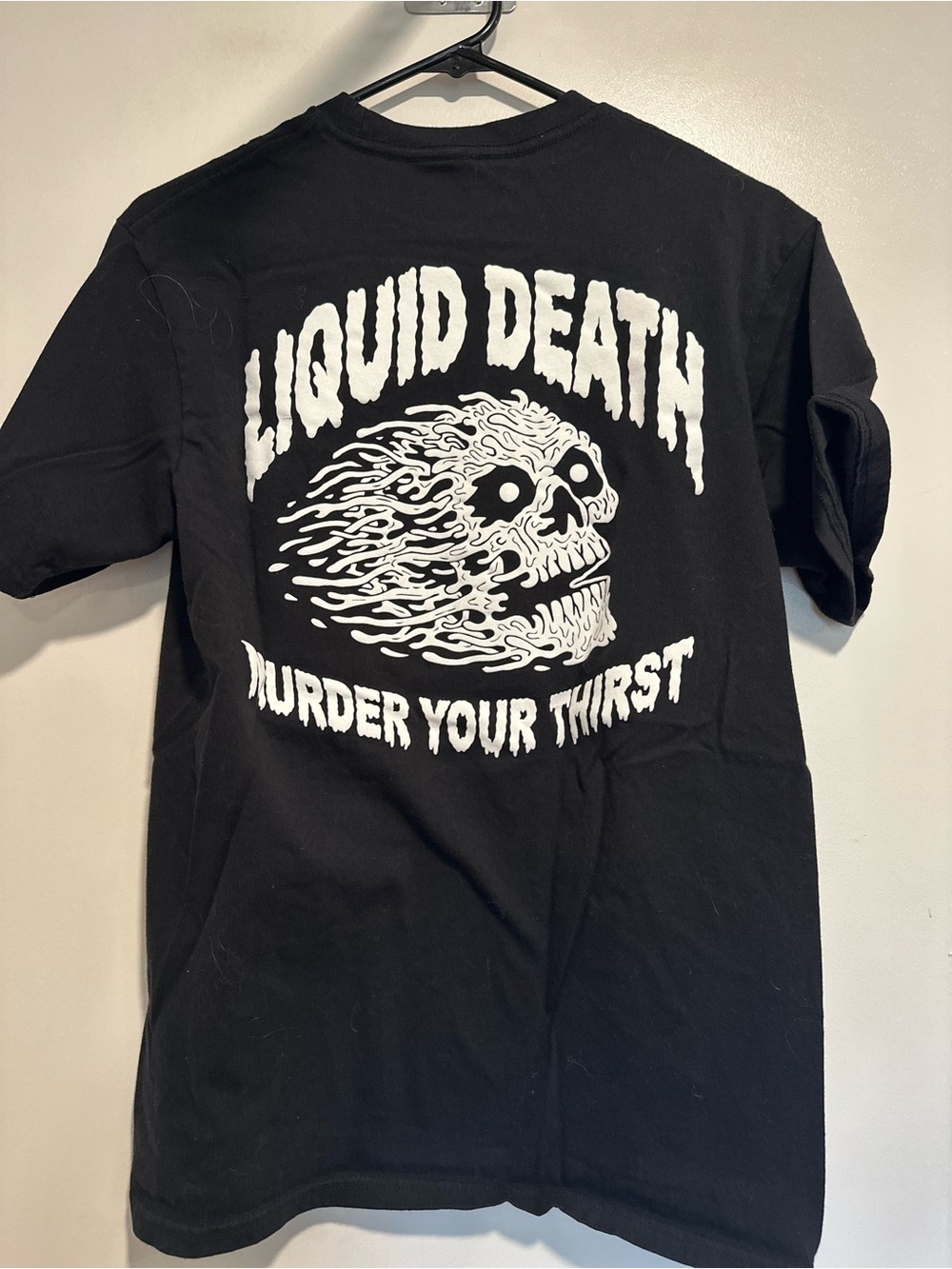 Liquid Death Sz:M Instant Death black/ white Melting Flaming Skull graphic Tee.